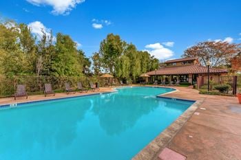 Relaxing resort-style pool with sundeck and spa